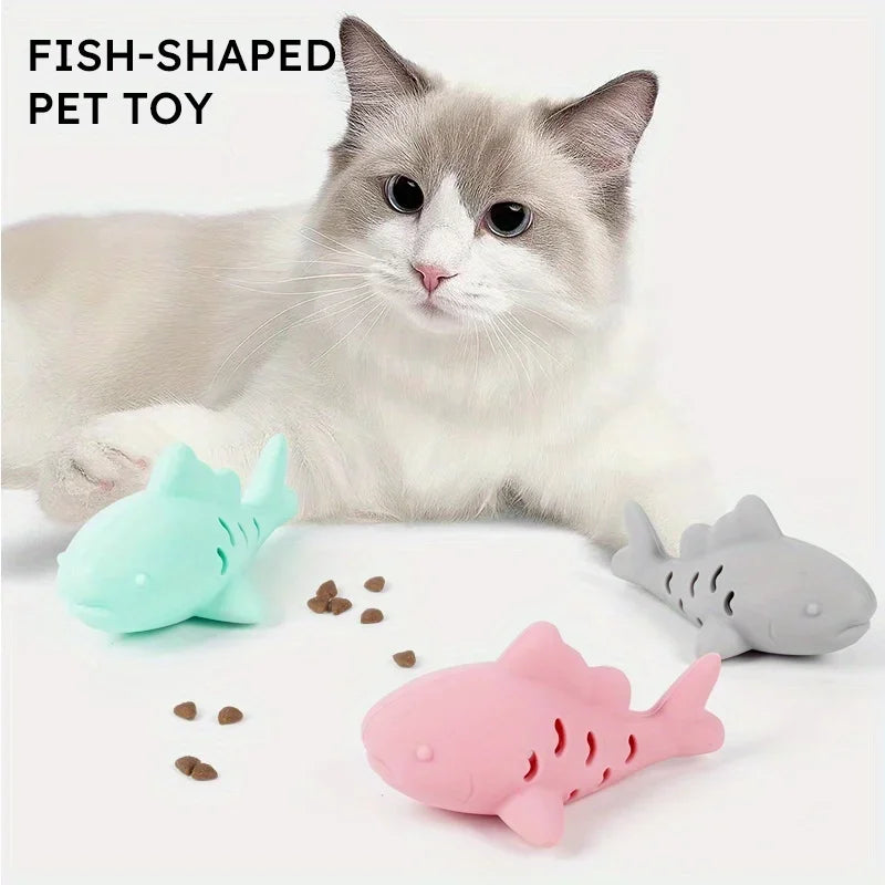 Interactive treat dispenser toy featuring fish-shaped design for cats and dogs, encourages play and mental stimulation.