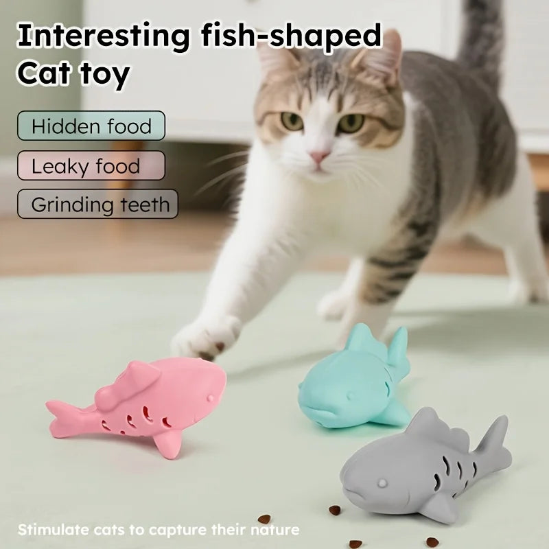 Interactive treat dispenser toy for cats shaped like fish, stimulating play and keeping pets entertained.