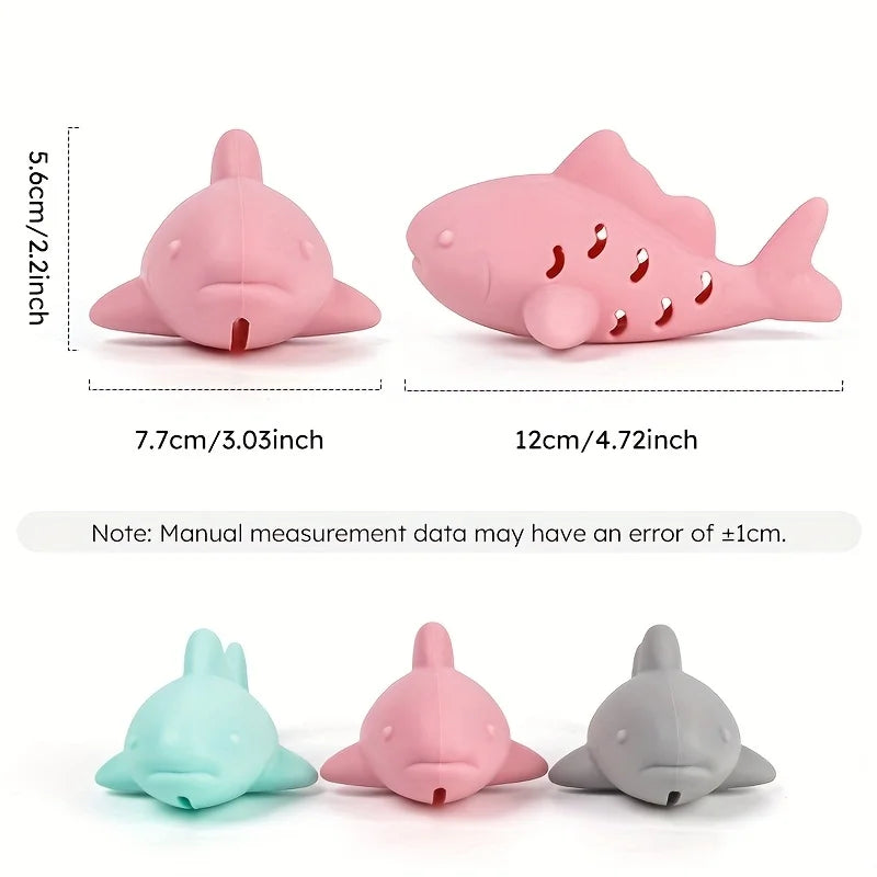 Interactive treat dispenser toy for pets, featuring a shark design that engages and entertains cats.