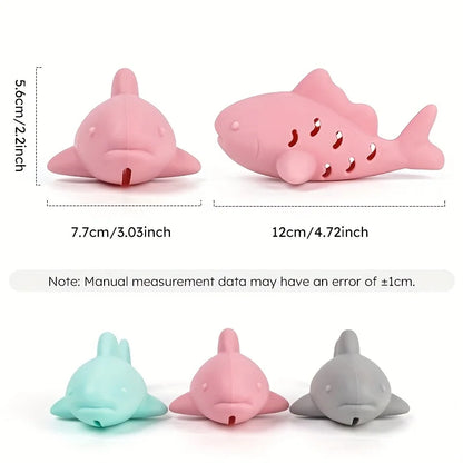 Interactive treat dispenser toy for pets, featuring a shark design that engages and entertains cats.